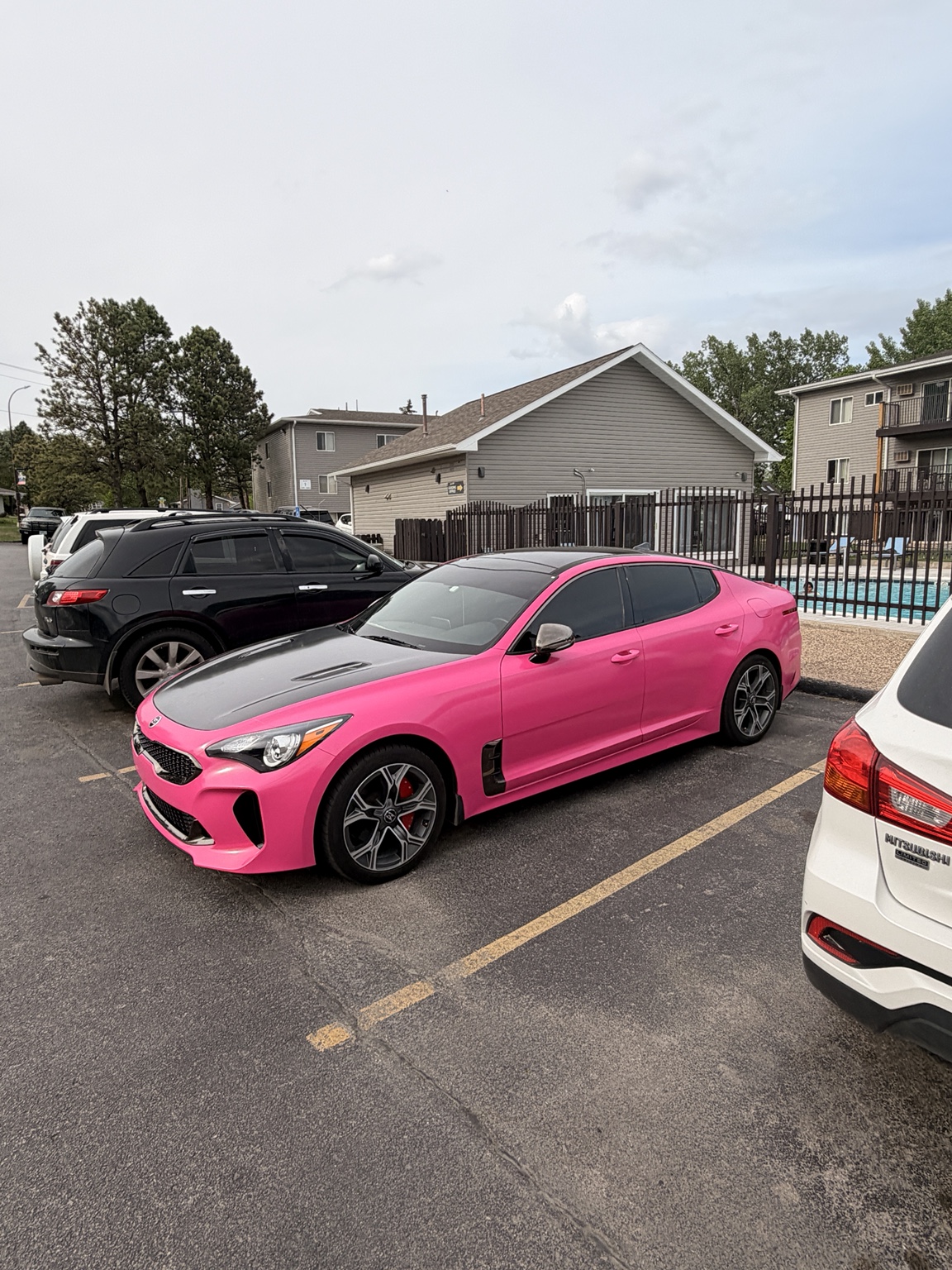 Pink wrapped sedan